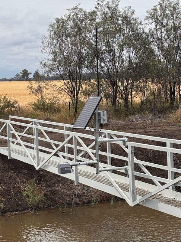 SynaptiX Flow installed on a pedestrian bridge over an irrigation channel